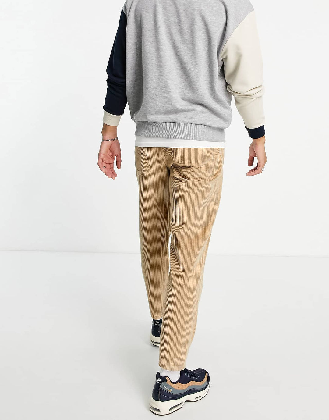 asos design corduroy tapered fit jeans in stone brown