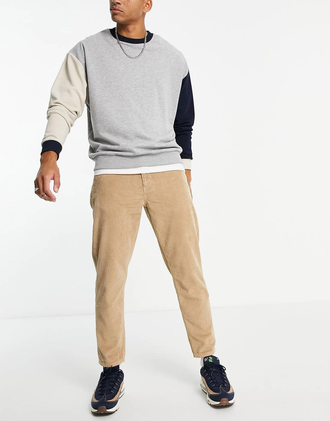 asos design corduroy tapered fit jeans in stone brown