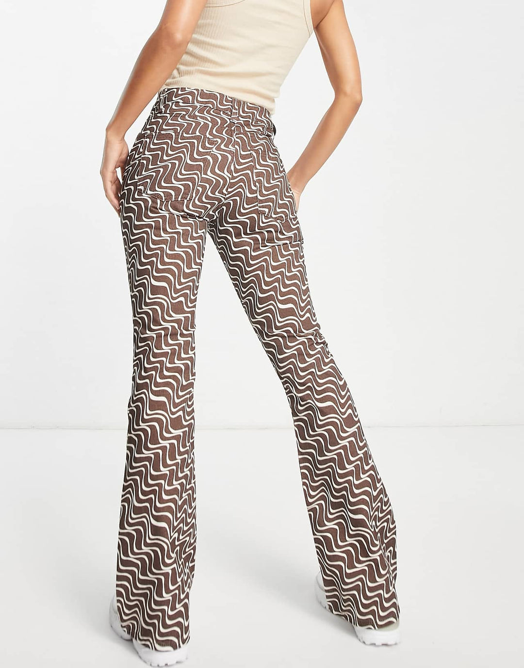 ASOS Design Puddle Flare Trouser in Chocolate Wavy Print