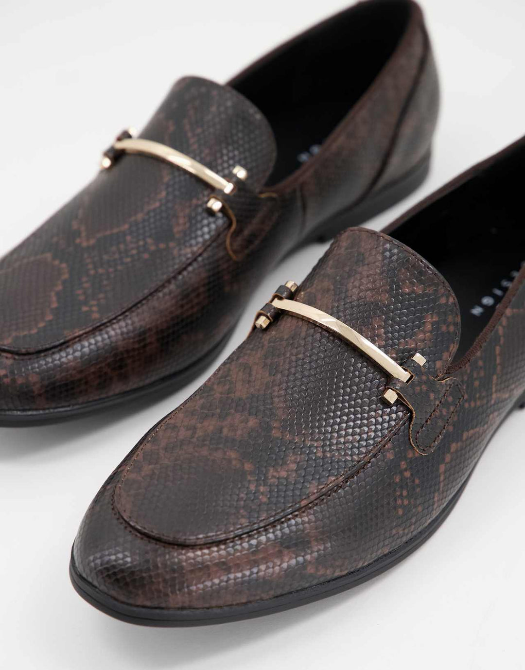 asos-design loafers in brown faux leather with snake effect and snaffle detail