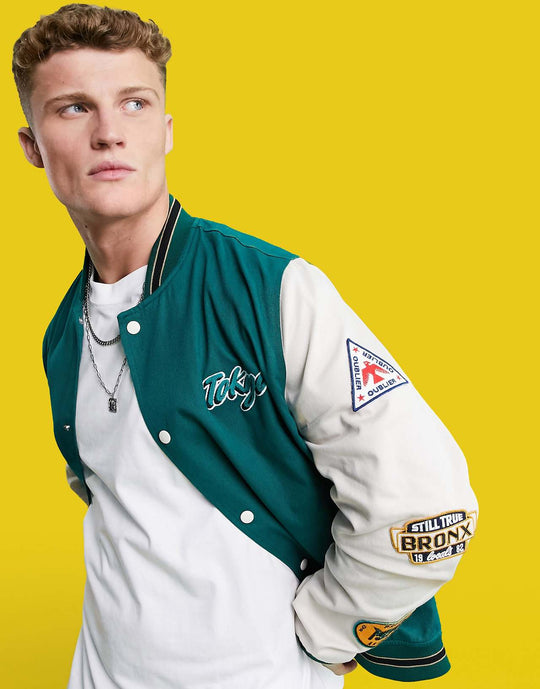ASOS Design Oversized Varsity Cotton Bomber Jacket in Green with Embroidery Badging