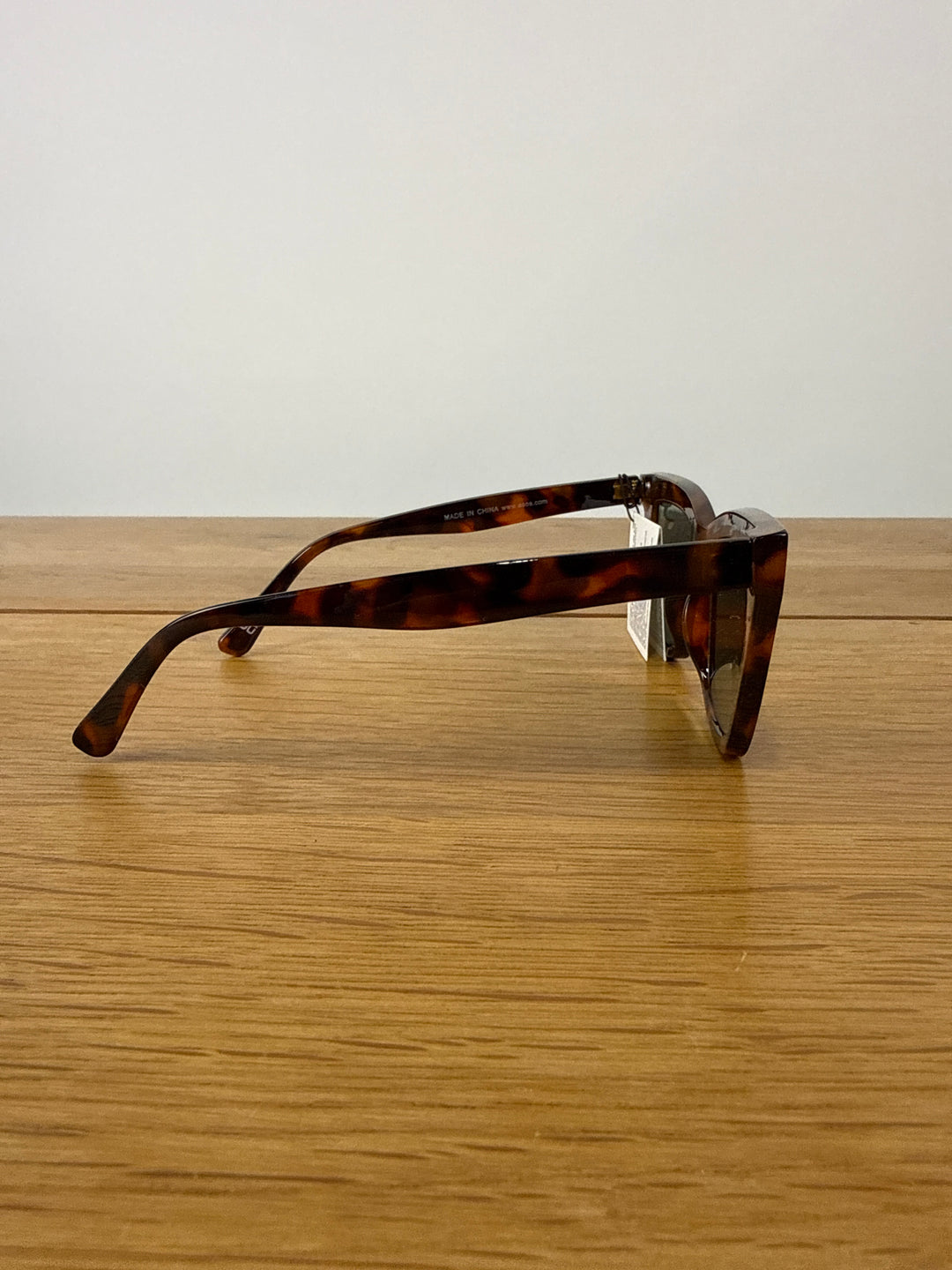ASOS DESIGN recycled angular frame cat eye in brown