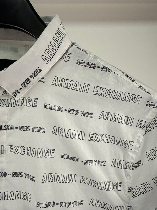 Armani Exchange all over print logo shirt in white