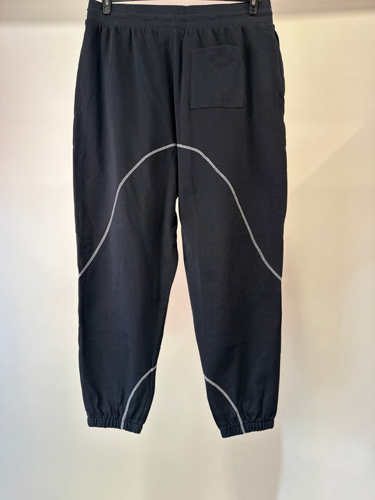 ASOS DESIGN co-ord relaxed joggers in black with tattoo print and stitching detail