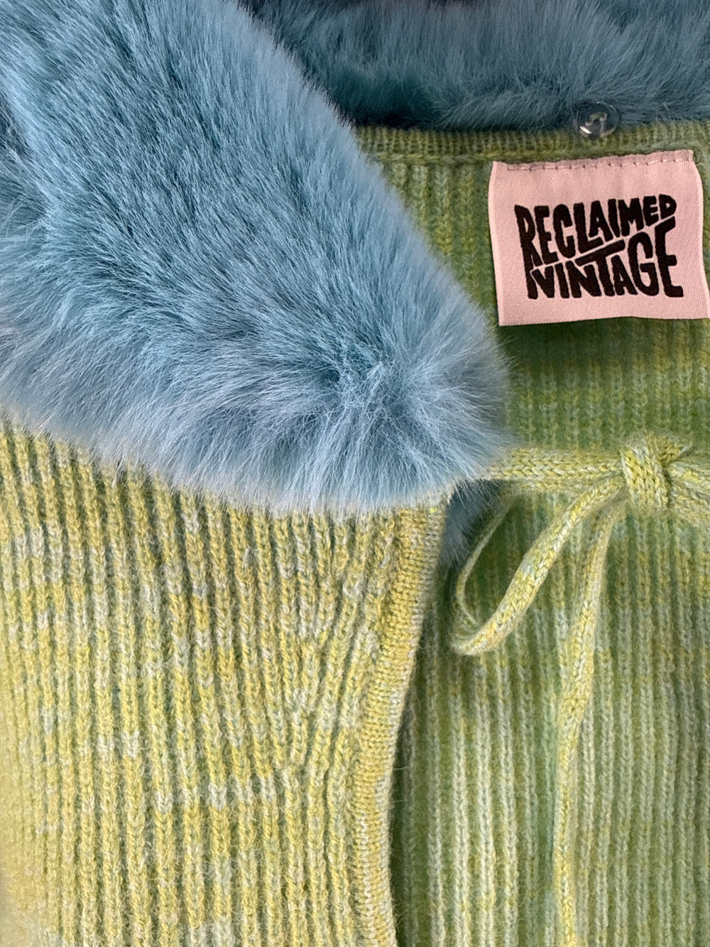 Reclaimed Vintage inspired knitted space dye cardigan with fur trim