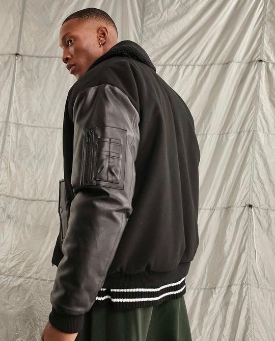 ASOS DESIGN oversized bomber jacket with borg collar in black