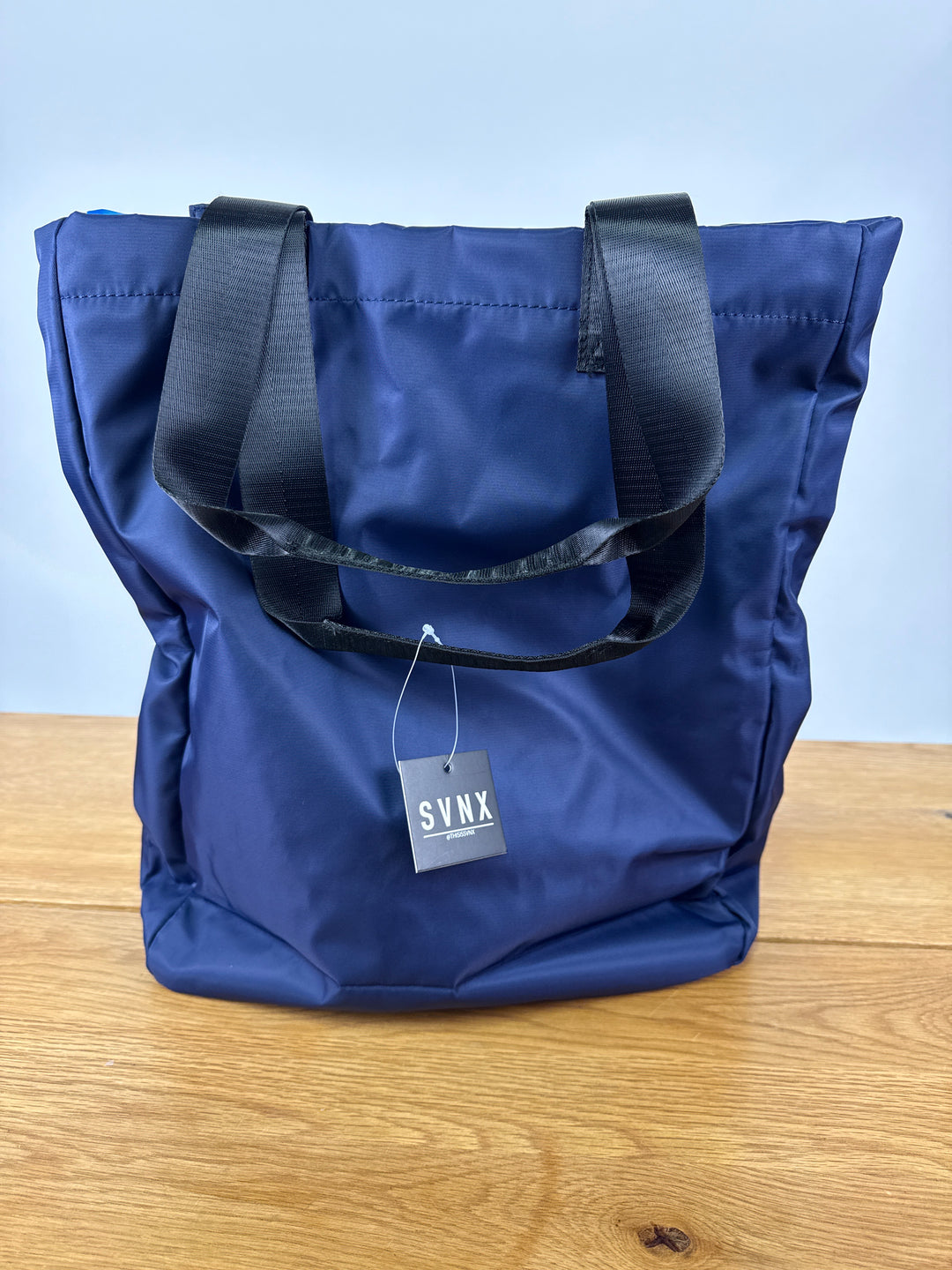 SVNX vibrant vacation tote bag in blue