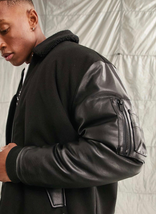 ASOS DESIGN oversized bomber jacket with borg collar in black