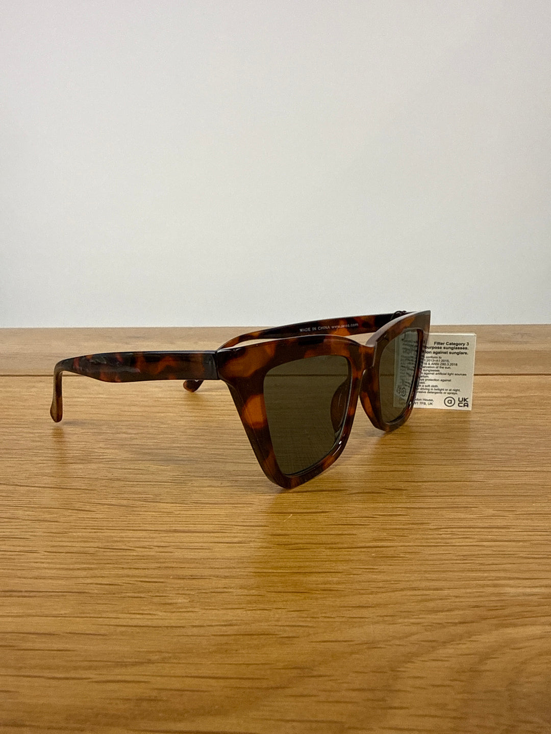 ASOS DESIGN recycled angular frame cat eye in brown
