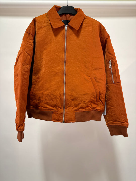 ASOS DESIGN washed oversized bomber jacket in mustard