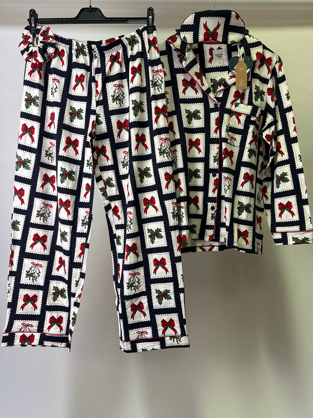 Chelsea Peers eco Jersey revere top and trouser pyjama set with eyemask and scrunchie in christmas stamp print
