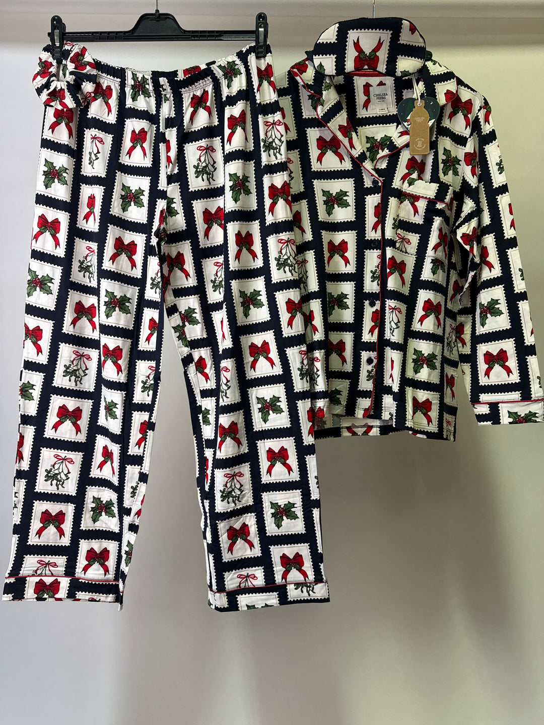 Chelsea Peers eco Jersey revere top and trouser pyjama set with eyemask and scrunchie in christmas stamp print