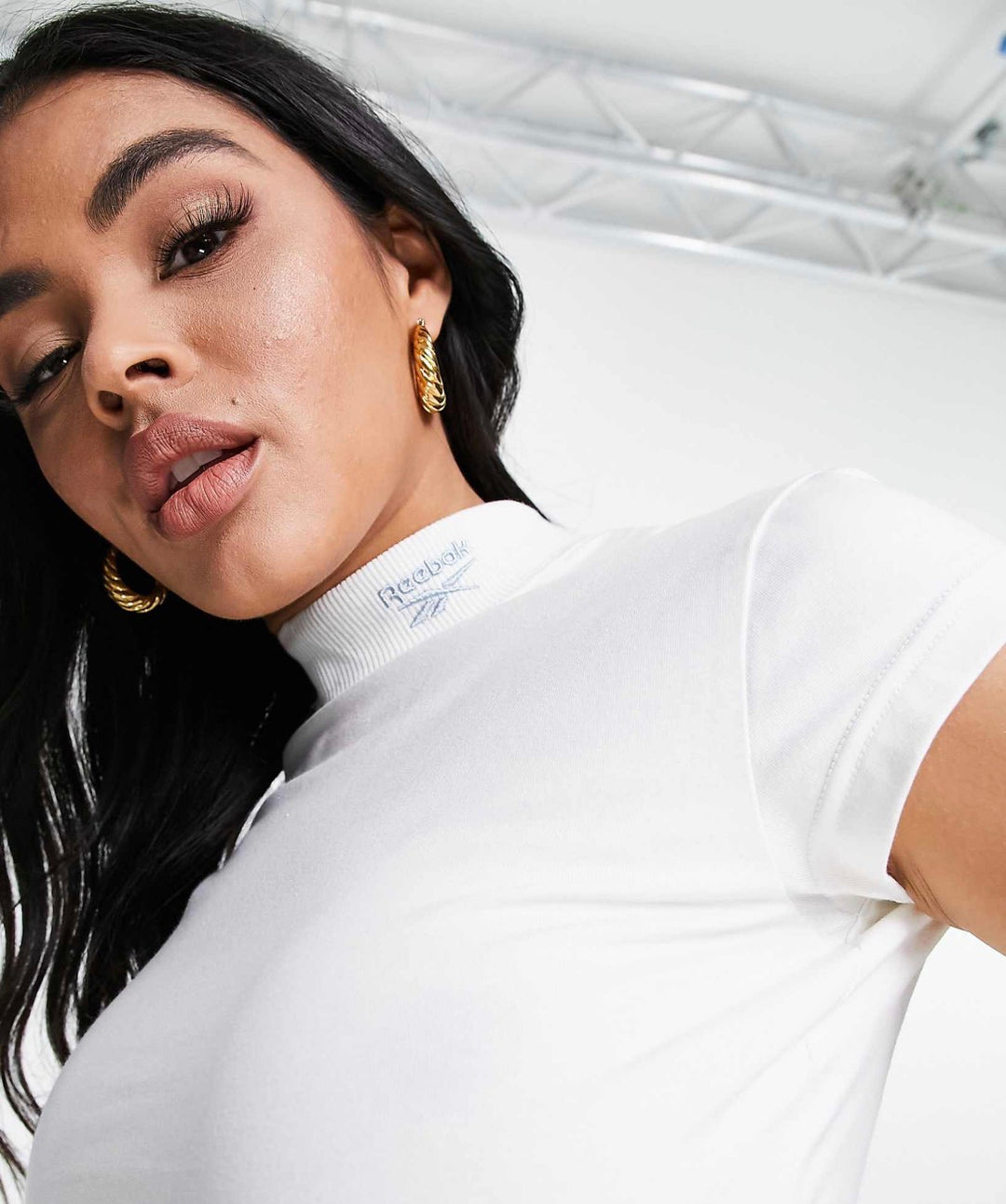 Reebok high neck crop top in white