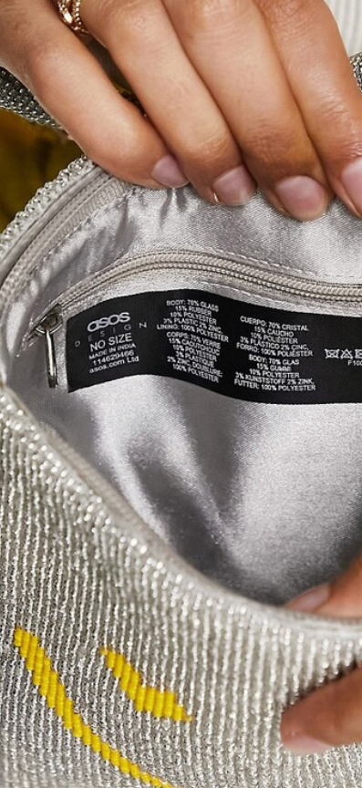 ASOS DESIGN beaded grab bag with happy face in silver