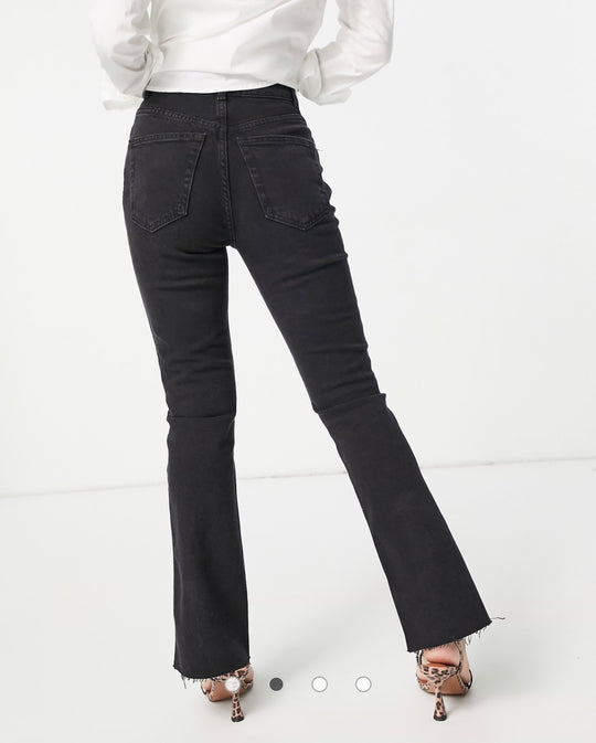 ASOS DESIGN Petite high rise '70's' stretch flare in washed black