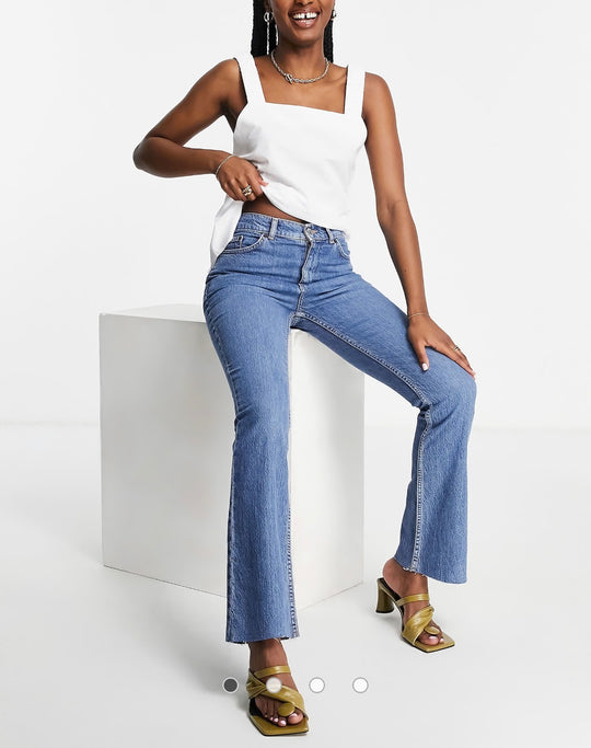 ASOS DESIGN Curve high rise '70's' stretch flare jeans in midwash