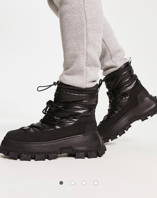 DESIGN puffer chelsea boot on chunky sole with lace detail in black wet.