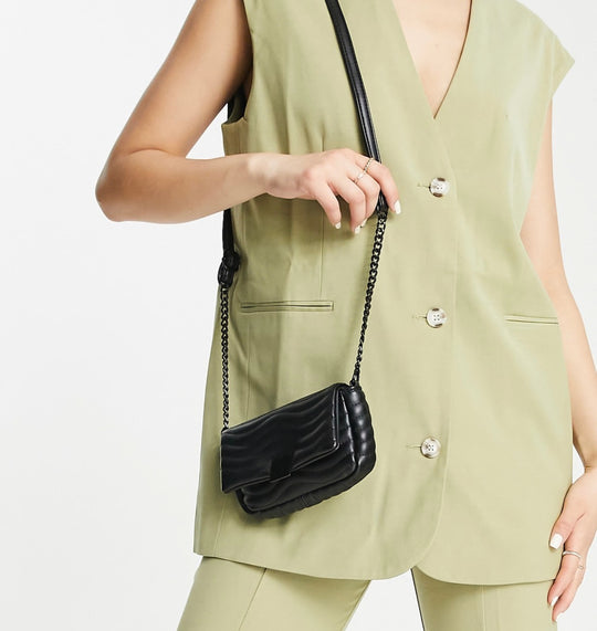 ASOS DESIGN mini detail quilted cross body bag with adjustable strap in black