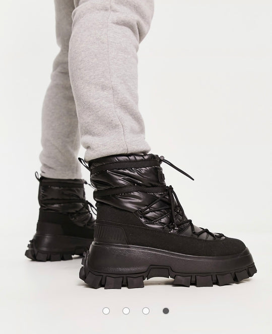 DESIGN puffer chelsea boot on chunky sole with lace detail in black wet.