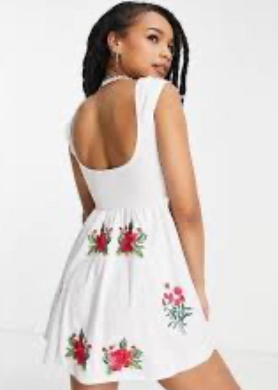 ASOS DESIGN Petite mini dress with corset detail and floral embroidery in white