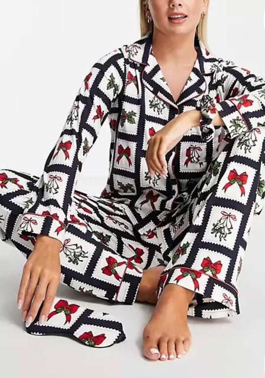 Chelsea Peers eco Jersey revere top and trouser pyjama set with eyemask and scrunchie in christmas stamp print