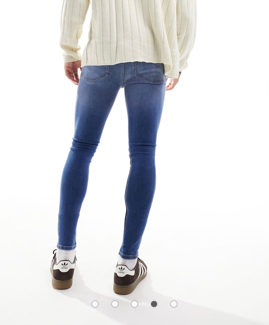ASOS DESIGN spray on jeans with power stretch in mid wash blue