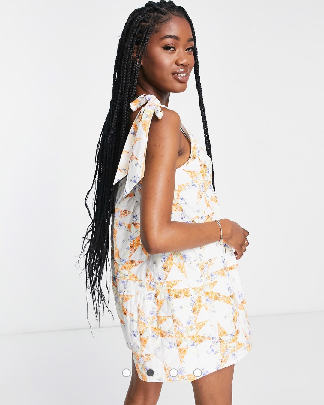 ASOS DESIGN quilted tie shoulder smock playsuit in mixed floral print