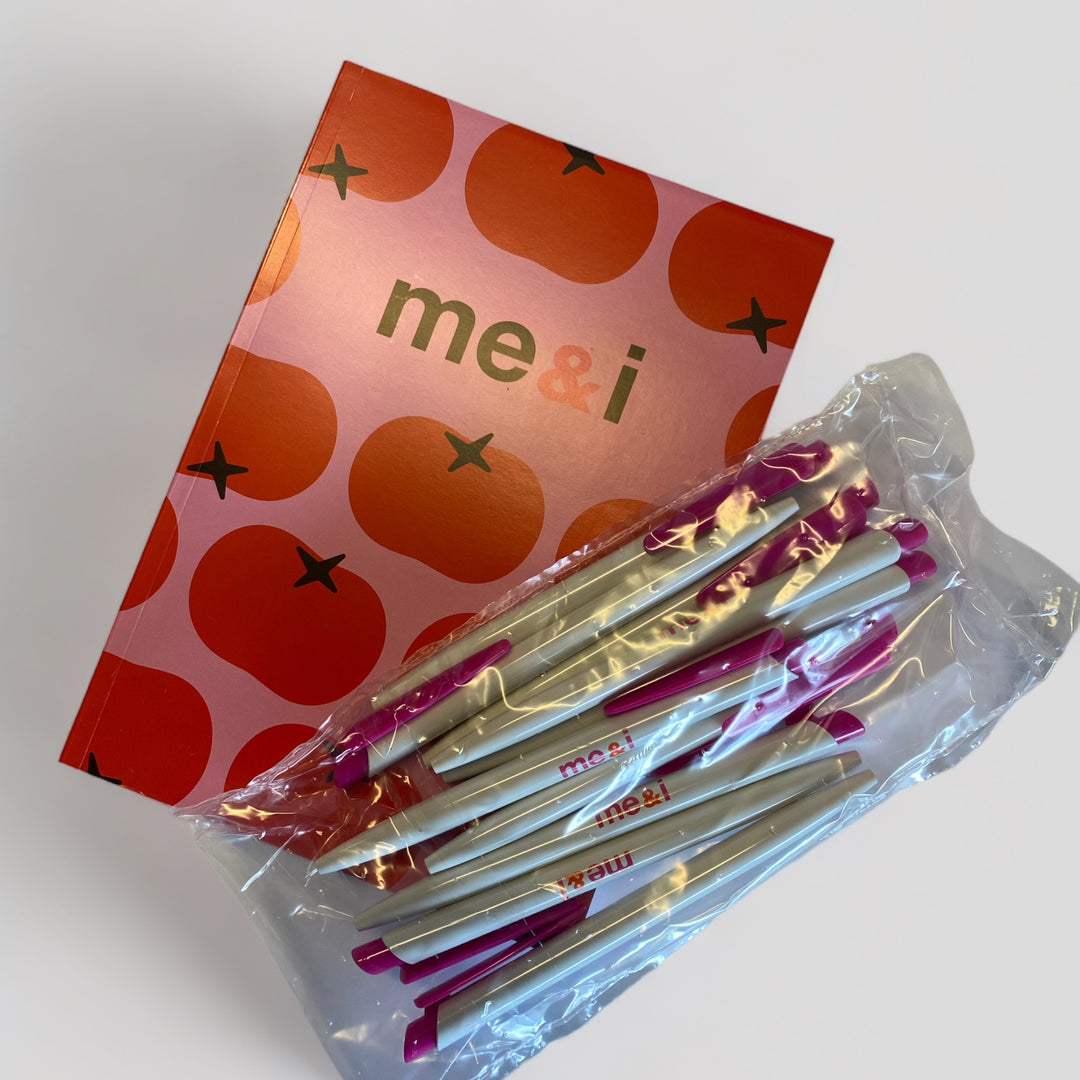 Me&i Notebook with pens.